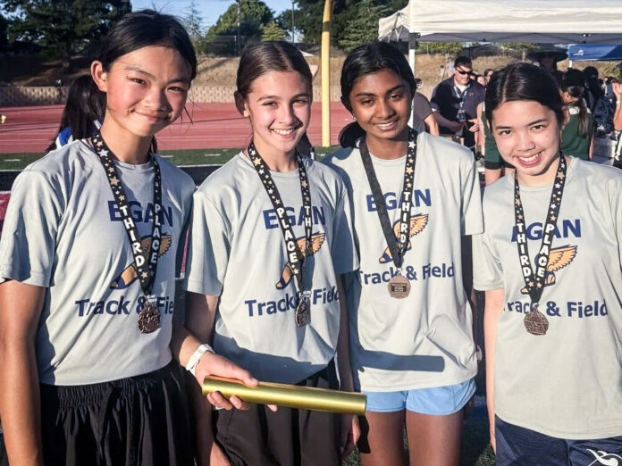 The Egan seventh grade girls 4x400 team that finished in third place. From the left, Katelyn Wang, Allison Krutzik, Mahi Choletti and Clara Grow.