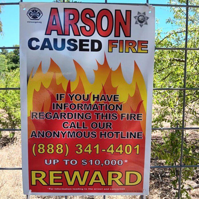 A $10,000 reward is being offered for information leading to the arrest and conviction of those responsible for the June 15 arson at Gardner Bullis Elementary School.